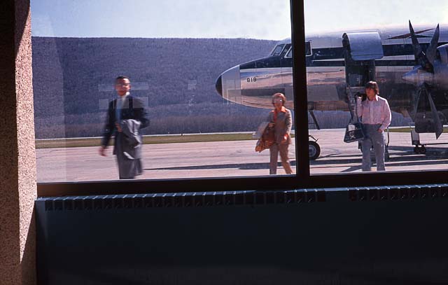 Corky and Lenny arriving at the airport in Montoursville.   1970's.   